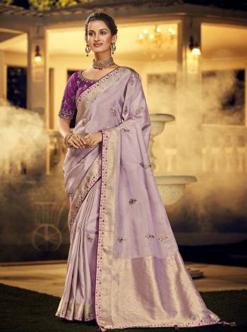 For A Royal And Beautiful Look, Grab This Beautifull Saree In Pretty Color Paired With Pretty Colored Blouse. This Saree Is Fabricated On Viscose Dola Silk Paired With Raw Silk Fabricated Blouse.