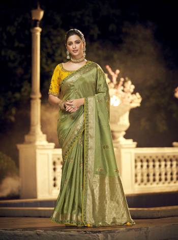 For A Royal And Beautiful Look, Grab This Beautifull Saree In Pretty Color Paired With Pretty Colored Blouse. This Saree Is Fabricated On Viscose Dola Silk Paired With Raw Silk Fabricated Blouse.