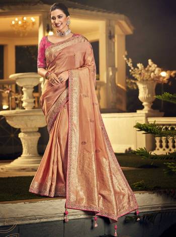 For A Royal And Beautiful Look, Grab This Beautifull Saree In Pretty Color Paired With Pretty Colored Blouse. This Saree Is Fabricated On Viscose Dola Silk Paired With Raw Silk Fabricated Blouse.