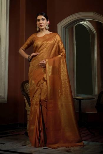 You Will Definitely Earn Lots Of Compliments Wearing This Pretty Elegant Looking Saree In Pretty Color Paired With Matching Blouse.This Saree and Blouse Are Fabricated On Art SIlk. It Is Beautified With Heavy Wevon Designer Work .