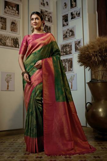 You Will Definitely Earn Lots Of Compliments Wearing This Pretty Elegant Looking Saree In Pretty Color Paired With Contrast Colored Blouse.This Saree and Blouse Are Fabricated On Art SIlk. It Is Beautified With Heavy Wevon Designer Work .