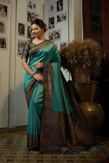 You Will Definitely Earn Lots Of Compliments Wearing This Pretty Elegant Looking Saree In Pretty Color Paired With Contrast Colored Blouse.This Saree and Blouse Are Fabricated On Art SIlk. It Is Beautified With Heavy Wevon Designer Work .