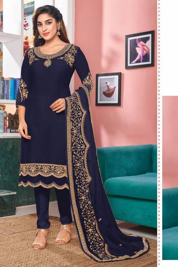 Look Pretty Wearing This Designer Suit In Blue Color Paired With Blue Colored Bottom And Dupatta. Its Top Is Fabricated On Georgette Paired With Santoon Bottom And Faux Georgette Dupatta. Its Top Is Beautified With Designer Embroidery,Stone Work. Buy Now