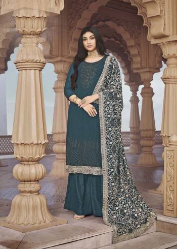 Looking Attractive This Designer Sharara Suit In Teal Blue Color.Its Beautified With Pretty Diamond And Embroidery Work Top Is Georgette Based Paired With Georgette Bottom And Georgette Fabricated Dupatta Which Gives An Attractive To The Suit.