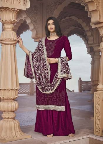 Looking Attractive This Designer Sharara Suit In Maroon Color.Its Beautified With Pretty Diamond And Embroidery Work Top Is Georgette Based Paired With Georgette Bottom And Georgette Fabricated Dupatta Which Gives An Attractive To The Suit.