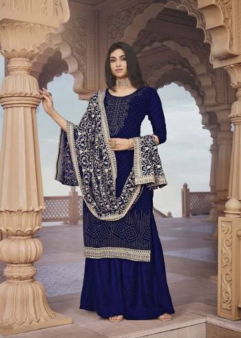 Looking Attractive This Designer Sharara Suit In Blue Color.Its Beautified With Pretty Diamond And Embroidery Work Top Is Georgette Based Paired With Georgette Bottom And Georgette Fabricated Dupatta Which Gives An Attractive To The Suit.