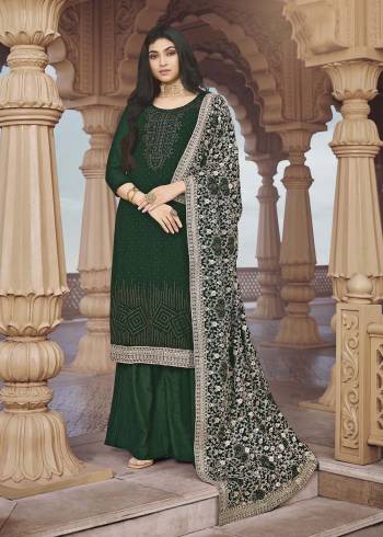 Looking Attractive This Designer Sharara Suit In Green Color.Its Beautified With Pretty Diamond And Embroidery Work Top Is Georgette Based Paired With Georgette Bottom And Georgette Fabricated Dupatta Which Gives An Attractive To The Suit.