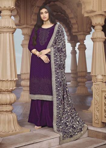 Looking Attractive This Designer Sharara Suit In Wine Color.Its Beautified With Pretty Diamond And Embroidery Work Top Is Georgette Based Paired With Georgette Bottom And Georgette Fabricated Dupatta Which Gives An Attractive To The Suit.