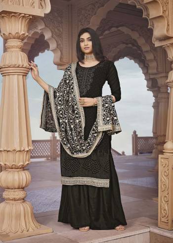 Looking Attractive This Designer Sharara Suit In Black Color.Its Beautified With Pretty Diamond And Embroidery Work Top Is Georgette Based Paired With Georgette Bottom And Georgette Fabricated Dupatta Which Gives An Attractive To The Suit.