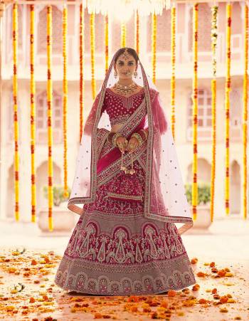 ?Grab These Heavy Designer Lehenga Choli In Lovely Color Paired With Pretty Designer Dupatta. Fabricated On Velvet Beautified With Heavy Attractive Designer Jari,Thread Embroidery.Heavy Embroidery Is Making The Lehenga More Attractive.Buy Thses Pretty Lehenga Now