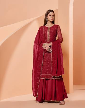 Grab These Designer Sharara Suits In Lovely Color.Its Pretty Designer Thread,Sequance Embroidery Work Top Is Georgette Based Paired Bottom Dull Santoon With Georgette Fabricated Dupatta Which Gives An Attractive To The Dress.Buy Now