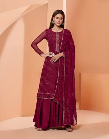 Grab These Designer Sharara Suits In Lovely Color.Its Pretty Designer Thread,Sequance Embroidery Work Top Is Georgette Based Paired Bottom Dull Santoon With Georgette Fabricated Dupatta Which Gives An Attractive To The Dress.Buy Now