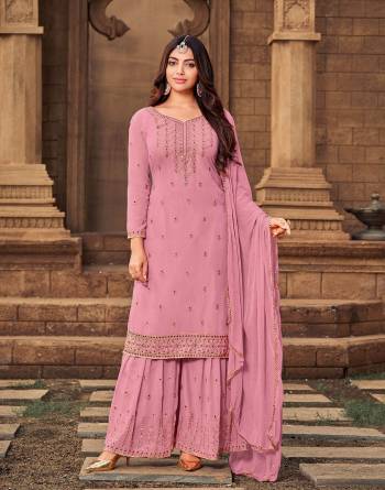 Grab These Designer Semi Stiched Sharara Suit In Wine Color Top Bottom And Duptta Its Fabricated On Georgette Based And Beautified With Heavy Designer Embroidery Work 