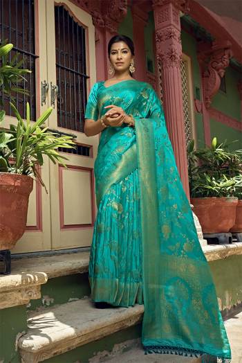 Enhance Your Personality In This Lovely Colored Pretty Saree. This Saree And Blouse Are Fabricated On Art Silk Beautified With Heavy Weaving Jacquard Designer Buy This Saree Now