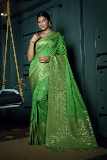 Enhance Your Personality In This Lovely Colored Saree. This Saree And?Blouse Are Art Silk Based Fabric With Heavy Wevon Jari Designer Work . Buy This Pretty Saree Now