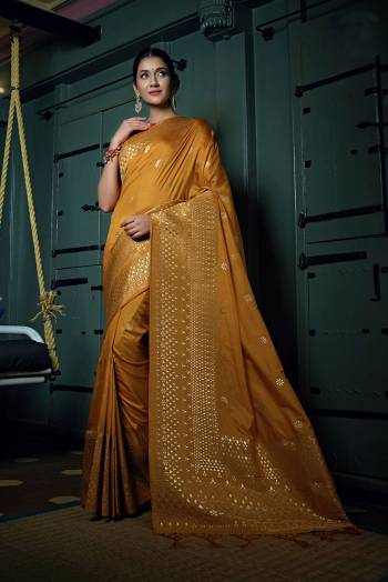 Enhance Your Personality In This Lovely Colored Saree. This Saree And?Blouse Are Art Silk Based Fabric With Heavy Wevon Jari Designer Work . Buy This Pretty Saree Now