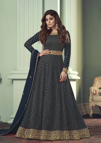 For a Bold And Beautiful Look,Grab This Free Size Stiched Designer Suit In Blue Color Paired With Blue Colored Bottom and Dupatta. Its Top Is Georgette Based With Santoon Bottom And Georgette Dupatta. Its Beautified With Heavy Sequance Embroidery Work. Buy Now