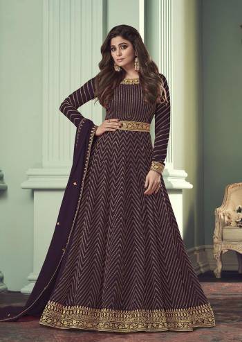 For a Bold And Beautiful Look,Grab This Free Size Stiched Designer Suit In Wine Color Paired With Wine Colored Bottom and Dupatta. Its Top Is Georgette Based With Santoon Bottom And Georgette Dupatta. Its Beautified With Heavy Sequance Embroidery Work. Buy Now