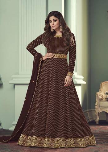 For a Bold And Beautiful Look,Grab This Free Size Stiched Designer Suit In Maroon Color Paired With Maroon Colored Bottom and Dupatta. Its Top Is Georgette Based With Santoon Bottom And Georgette Dupatta. Its Beautified With Heavy Sequance Embroidery Work. Buy Now