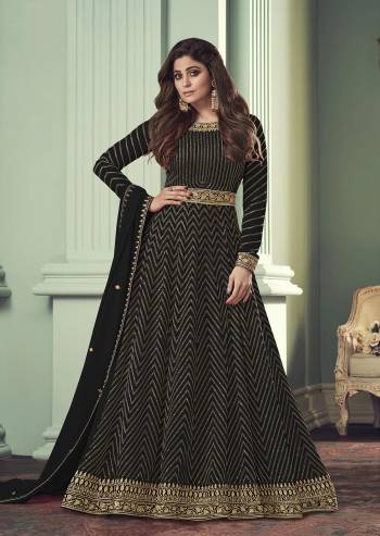 For a Bold And Beautiful Look,Grab This Free Size Stiched Designer Suit In Black Color Paired With Black Colored Bottom and Dupatta. Its Top Is Georgette Based With Santoon Bottom And Georgette Dupatta. Its Beautified With Heavy Sequance Embroidery Work. Buy Now