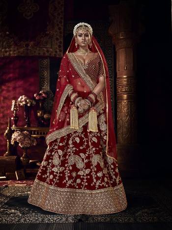 Look Beautifull In This Heavy Designer Semi Stiched Lehenga In Maroon Color. It Is Fabricated On Velvet Blouse And Lehenga WithNet Dupatta. Beautified With All Over Heavy Cording,Sequance Embroidery,Stone Work.