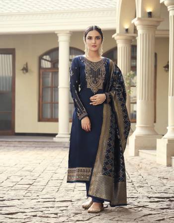 You Will Definitely Earn Lots Of Compliments Wearing This Designer Suits.This Suit Fabricated On Satin Georgette Beautified With Embroidery Work,Wevon Meenakari Dupatta.