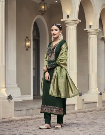 You Will Definitely Earn Lots Of Compliments Wearing This Designer Suits.This Suit Fabricated On Satin Georgette Beautified With Embroidery Work,Wevon Meenakari Dupatta.