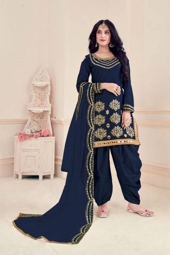 Enhance Your Personality Wearing This Designer Patiala Suit In Blue Colored Top Paired With Matching Bottom And Dupatta.This Suit Is Bitalian Soft Silk Based Paired With Bitalian Soft Silkn Bottom And Net Dupatta. Buy Now