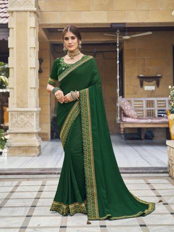 Enhance Your Personality In This Lovely Colored Saree This Saree And Blouse Are Vichitra Silk Based Fabric With Heavy Jari,Resham Embroidery Work,Tassles . Buy This Pretty Saree Now