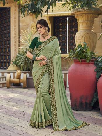 Enhance Your Personality In This Lovely Colored Saree This Saree And Blouse Are Vichitra Silk Based Fabric With Heavy Jari,Resham Embroidery Work,Tassles . Buy This Pretty Saree Now