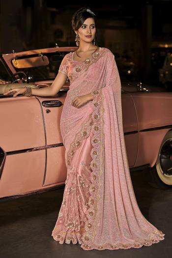 Every Girl And Woman dreams to wear a saree. A saree that would make her look youthful,fresh and subtle yet outstanding. This saree s Pretty Colored And Fabricated On Net And Beautified With Designer Work.