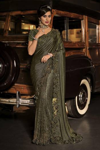 Every Girl And Woman dreams to wear a saree. A saree that would make her look youthful,fresh and subtle yet outstanding. This saree s Pretty Colored And Fabricated On Net And Beautified With Designer Work.