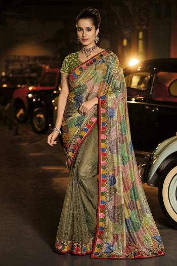 Every Girl And Woman dreams to wear a saree. A saree that would make her look youthful,fresh and subtle yet outstanding. This saree s Pretty Colored And Fabricated On Net And Beautified With Designer Work.