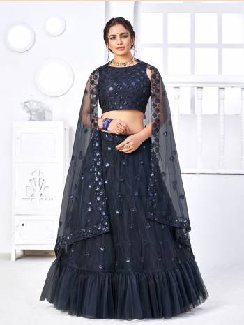 Look Attractive In This Designer Heavy Lehenga Choli In Pretty Color Paired With Lovely Blouse And Dupatta.Its Lehenga Is Net Based Fabric.Beautified With Heavy Thread,Sequance Embroidery Work.