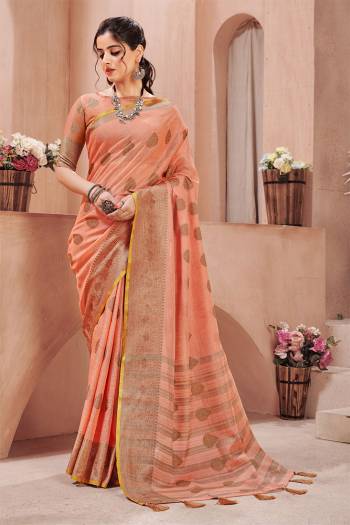 Look Beautifull In This Pretty Saree Come With Beautifull Colored. It?Is Fabricated On Linen. Beautified With Wevon Reasham Designer.