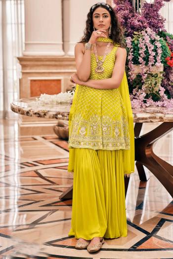 Grab These Designer Sharara Suits In Lovely Color.Top And Bottom Is Fabricated On Viscose Georgette Paired Soft Net Dupatta Which Gives An Attractive To The Suits.Buy Now