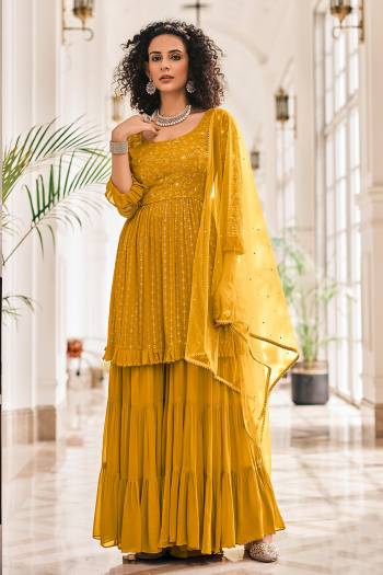 Grab These Designer Sharara Suits In Lovely Color.Top And Bottom Is Fabricated On Viscose Georgette Paired Soft Net Dupatta Which Gives An Attractive To The Suits.Buy Now