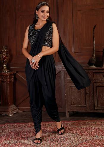 For A Bold And Beautiful Look, Grab This Readymade Dhoti Saree In Beautifull Colored Paired With Black Colored Velvet Blouse. This Saree Is Fabricated On Lycra Beautified With Sequance Work.