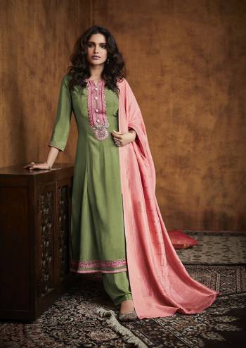 Here Is A Very Beautiful Readymade Designer Suit In Pretty Color Top is Fabricated On Fiyona Silk Pair With Fiyona Silk Bottom And Muslin Jacquard Dupatta Beautified With Embroidery,Hand Work And Wevon Designer