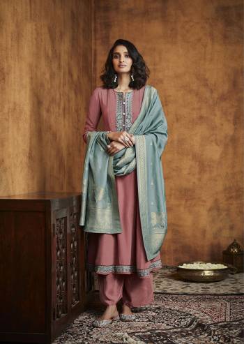 Here Is A Very Beautiful Readymade Designer Suit In Pretty Color Top is Fabricated On Fiyona Silk Pair With Fiyona Silk Bottom And Muslin Jacquard Dupatta Beautified With Embroidery,Hand Work And Wevon Designer