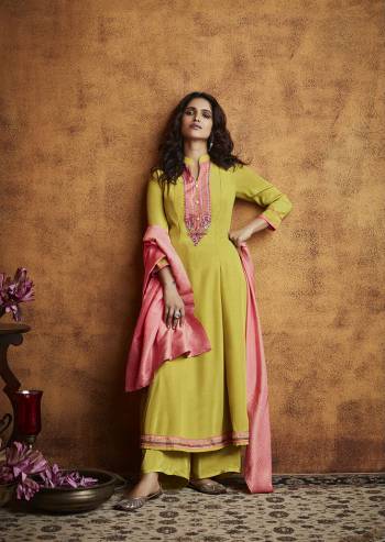 Here Is A Very Beautiful Readymade Designer Suit In Pretty Color Top is Fabricated On Fiyona Silk Pair With Fiyona Silk Bottom And Muslin Jacquard Dupatta Beautified With Embroidery,Hand Work And Wevon Designer