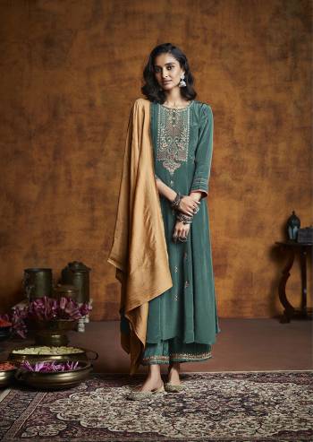 Adorn The Pretty Angelic Look Wearing This Designer Suit In Lovely Color. Its Pretty Top Is Fabricated on Fiyona Silk Beautified With Heavy Embroidery Work,Wevon Designer Giving A Heavy Look Paired With Fiyona Silk Bottom And Muslin Jacquard Fabricated Dupatta. Buy Now