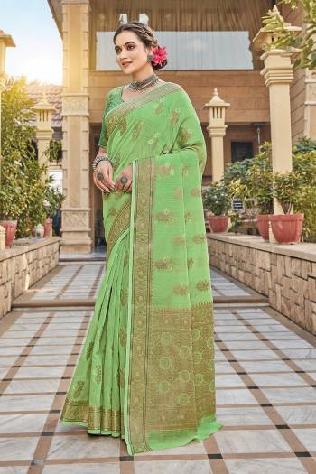 You Will Definitely Earn Lots Of Compliments Wearing This Pretty Elegant Looking Saree In Pretty Color Paired With Matching Colored Blouse.This Saree and Blouse Are Fabricated On Cotton. It Is Beautified With Printed Designer Weaving Work