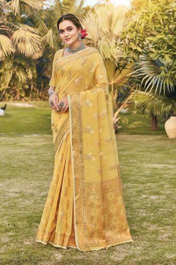 You Will Definitely Earn Lots Of Compliments Wearing This Pretty Elegant Looking Saree In Pretty Color Paired With Matching Colored Blouse.This Saree and Blouse Are Fabricated On Cotton. It Is Beautified With Printed Designer Weaving Work