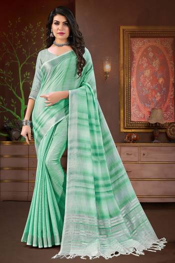 Here Is A Beautiful Digital Print Linen Fabricated Saree And Blouse.This Saree And Blouse Are Beautified With Wevon Designer.Buy This Pretty Saree Now