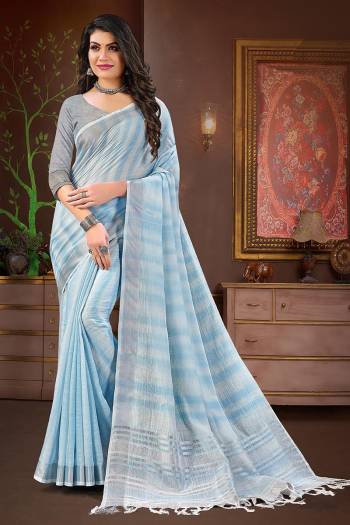 Here Is A Beautiful Digital Print Linen Fabricated Saree And Blouse.This Saree And Blouse Are Beautified With Wevon Designer.Buy This Pretty Saree Now