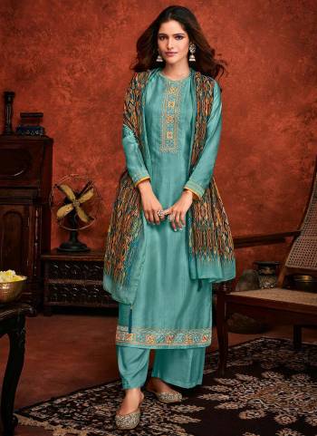 Adorn The Pretty Angelic Look Wearing This Readymade Suit In Lovely Color. Its Pretty Top Is Fabricated on Fiyona Silk Beautified With Designer Embroidery Work,Digital Printed Giving A Heavy Look Paired With Fiyona Silk Bottom And Muslin Jacquard Fabricated Dupatta. Buy Now