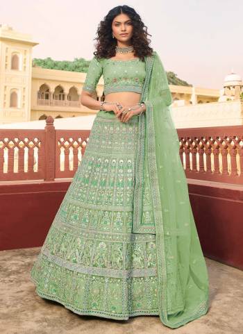 Look Attractive In This Designer Heavy Lehenga Choli In Pretty Color Paired With Lovely Blouse And Dupatta.Its Beautified With Heavy Jari,Thread,Dori Embroidery,Zarkan Work.Buy Now