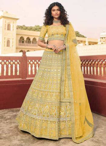 Look Attractive In This Designer Heavy Lehenga Choli In Pretty Color Paired With Lovely Blouse And Dupatta.Its Beautified With Heavy Jari,Thread,Dori Embroidery,Zarkan Work.Buy Now