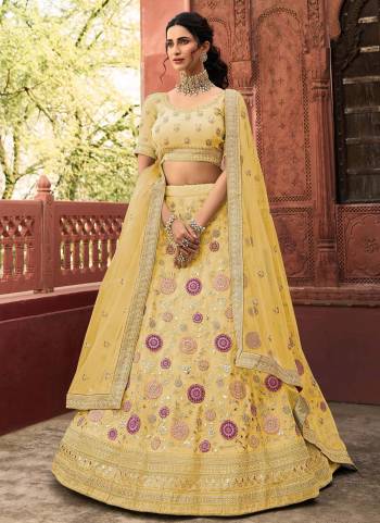 Look Attractive In This Designer Heavy Lehenga Choli In Pretty Color Paired With Lovely Blouse And Dupatta.Its Beautified With Heavy Jari,Thread,Dori Embroidery,Zarkan Work.Buy Now